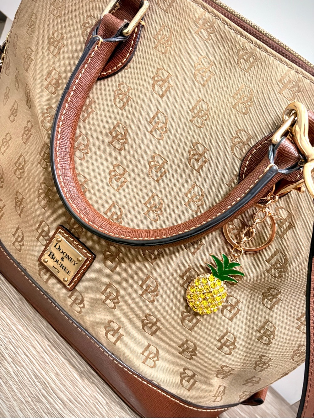 Dooney & Bourke Tan and Brown Signature Satchel with Pineapple Charm - Picture 2 of 9